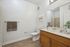 Large vanity in bathroom.