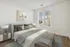 Bedroom large enough for queen bed and two night tables with large window.
