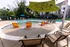 Wading area with in-pool loungers and spray ground