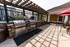 Close-up of large stainless steel grills in outdoor grilling area
