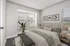 Bright and airy modern bedroom with large windows, stylish decor, and minimalist furnishings.