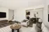 Modern living room with chic furnishings, elegant dining area, and contemporary open kitchen layout.