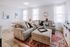 Residents Lounging in the Living Area | LC Brier Creek | Apartments in Durham, NC