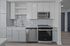 Modern kitchen with sleek cabinetry, stainless steel appliances, and elegant tile backsplash.