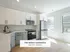 Bright and modern kitchen with sleek cabinetry and stainless steel appliances, perfect for stylish cooking and entertaining.