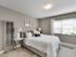 large bedroom with installed lighting