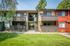 Apartments For Rent In Concord, CA - Diablo View & Villa Diablo - Outdoor Community Barbecue Area With Plenty Of Counter Space, Chairs, Trees, And Fence.