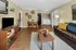 Spacious Living Room with modern furniture and Washer and Dryer
