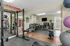 Weight lifting at Raiders Walk with ample room, yoga balls, and mats for residents to practice and relax