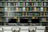 1810 The Social, interior, computer room, gray, white, green, black, yellow book wall paper, three Mac computers, white desk and chairs