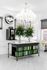 1810 The Social, interior, coffee book room, white, black, green, a sparkling chandelier, windows, table and chairs