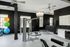 1810 The Social, interior, fitness center, gray, white, black decor, ceiling fans, windows, lockers, weight machines and hand weights