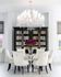 1810 The Social, interior, library, white table ad chairs, white walls, white floor, accents of yellow and black