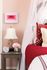 1810 The Social, interior, bedroom, white, red and pink decor, bed, wall art, desk and chair, bed curtain, laimp