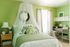 1810 The Social, interior, bedroom, green and white decor, bed, bed curtain, desk, chair, shelves, night stand