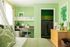 1810 The Social, interior, bedroom, green and white decor, bed, bed curtain, desk, chair, shelves, dresser, closet