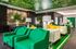 1800 The Ivy, interior, white, black, yellow, green decor, sofas, pillows, bar seating,