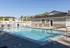 Outdoor swimming pool with lounge seating | Cedar Breaks | Apartments in Taylorsville, UT