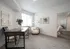 Bright and inviting home office with stylish desk, comfy chair, and chic decor in a modern apartment.| Point of View | Apartments in Draper, Utah
