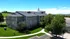 Modern three-story apartment building surrounded by lush greenery and a clear blue sky, offering serene living with nearby urban amenities.