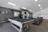 Inviting communal area featuring a modern pool table, cozy seating, and a stylish fireplace, perfect for social gatherings.