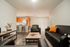 Sparq-on-Rio-Apartments-Near-UT-Austin-Fully-Furnished-Living-Room-and-Kitchen