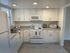 Updated Kitchen w/white cabinets and appliances