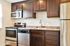 Kitchen fully updated with stainless steel appliances, (gas range, dishwasher, microwave, fridge)