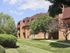 Applegate Apts; Exterior, 3 story building, balconies and patios, manicured lawn, trees, shrubs, walkway