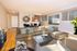 Living room and Dining room with hardwood floors and breakfast bar