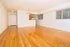 living room dining room with hardwood floors and breakfast bar