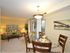 Dining Room with chandelier, Living Room with walkout patio