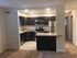 Stainless steel kitchen appliances. updated dark cabinets. two kitchen entry
