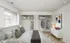 Bedroom with wall to wall carpet, 2 closets along the wall