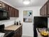 Galley Kitchen with updated black appliances, Gas range, dishwasher, and Frost free fridge