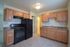 Huge eat-in kitchen with updated appliances. gas range