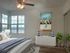 Hardwood floor bedroom.