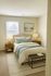 Bedroom, two night stands, artwork, and window with blinds