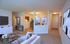 Entry foyer. Living room. Open dining room.