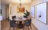 dining room with wall-to-wall carpet.