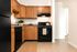 Kitchen with black appliances