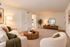 Park Crescent Apartments living room with carpeted floors, comfortable seating, and natural light
