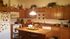 A kitchen area with light fixtures and appliances. | Rental houses near Schriever SFB, CO