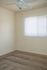A room with a grey carpet and light walls.  | Homes for rent near Holloman AFB, Alamogordo, NM