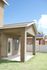 A backyard patio and lawn. | Alamogordo Homes for rent near Holloman AFB, NM