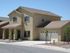 A light grey, two-story home. | Homes for rent near Holloman AFB, Alamogordo, NM