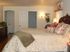 Decorated bedroom with hardwood floors | Ft Knox Apartments