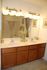 A bathroom with light countertops and cabinets. | On-Base Housing Peterson AFB, CO | Colorado Springs, CO