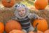 Baby in Halloween Costume with Pumpkins | Oak Grove KY apartments