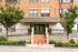 Charming Library Hill entrance featuring elegant architecture and inviting greenery at 740 West Wisconsin Ave.